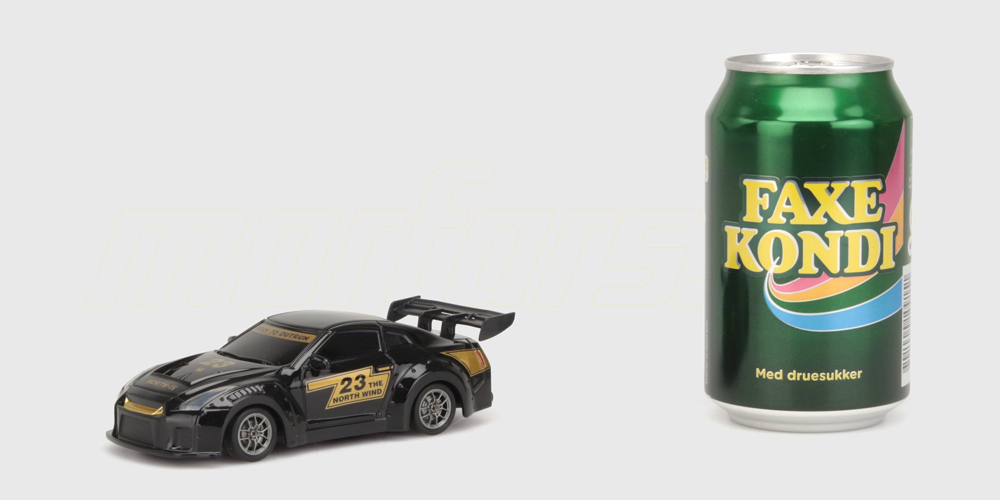 Mini BTD størrelses sammenligning med en dåse