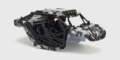 Sort Hurricane Body karrosseri med blå og hvide detaljer til fjernstyret bil vist på hvid baggrund.