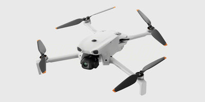 DJI Lito 1 foldet ud i fuld størrelse med kamera og stort batteri set på hvid baggrund
