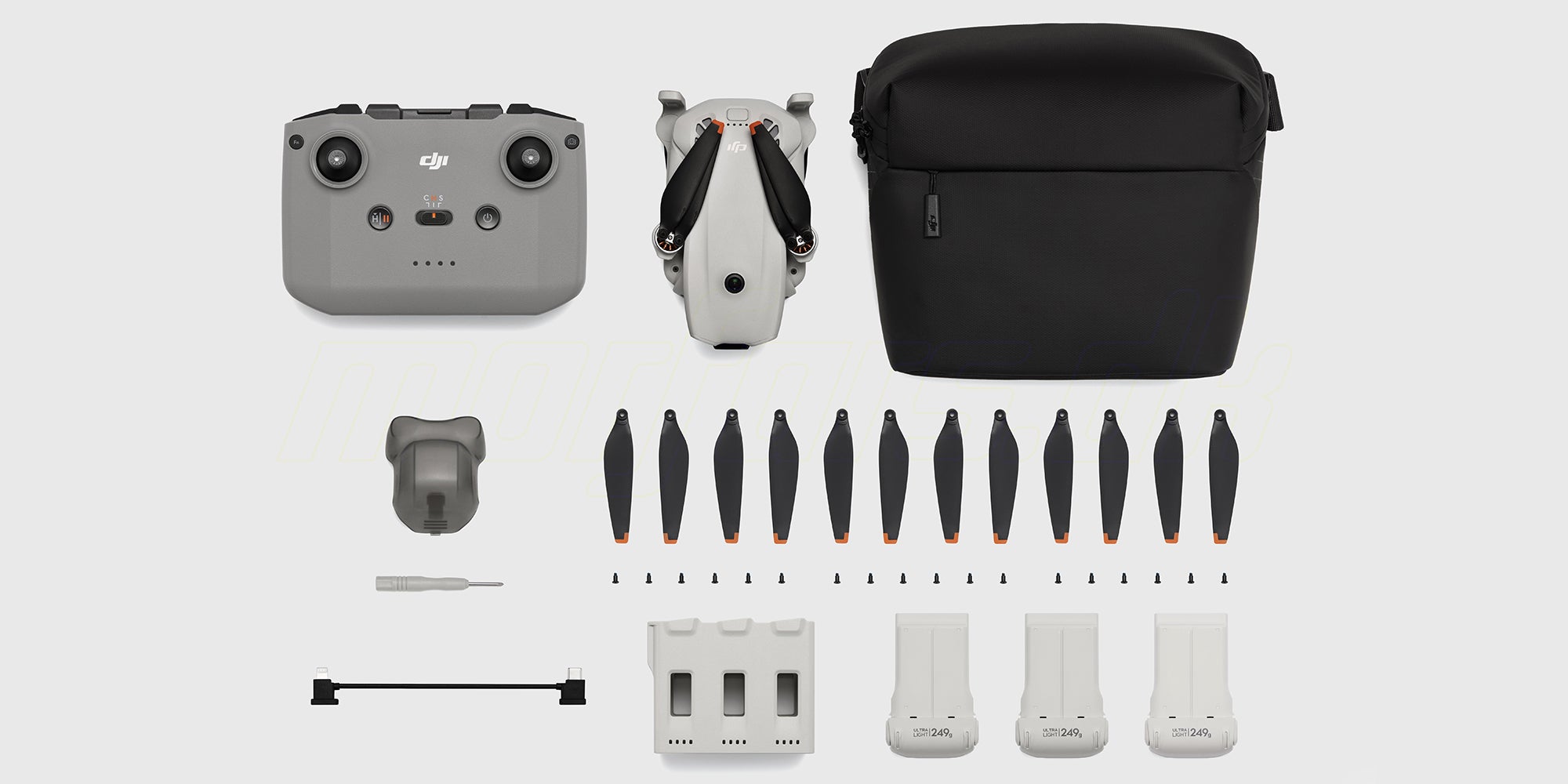 DJI Lito 1 fly more combo med ekstra batterier, multioplader, skuldertaske og ekstra propeller set på hvid baggrund