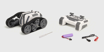 Stunt Tank fjernstyret bil i original emballage med billede af den blå stuntbil og fjernbetjening.