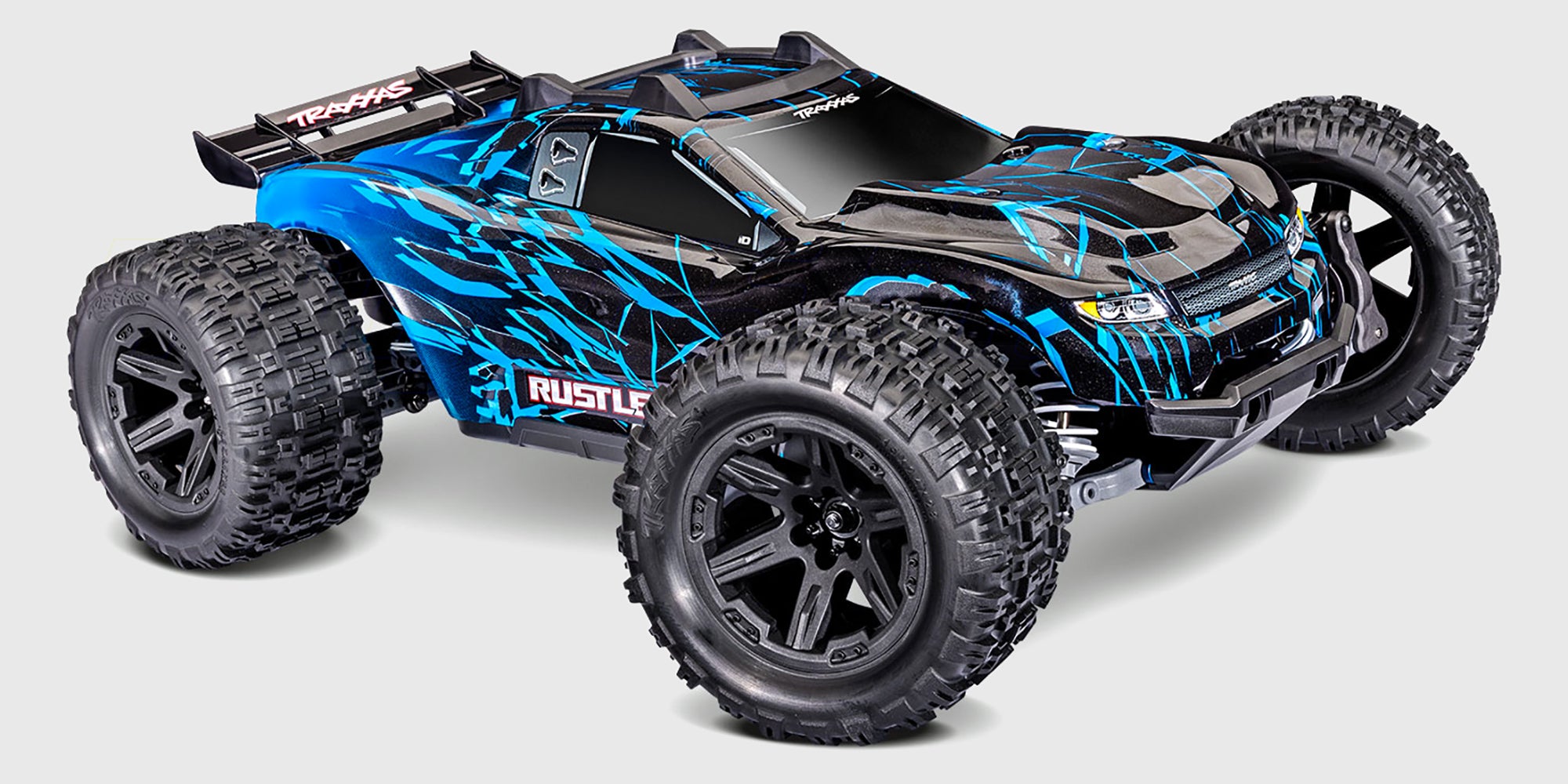 Traxxas Rustler 4x4 Brushless VX3 stadium truck set forfra med blå og sort karosse