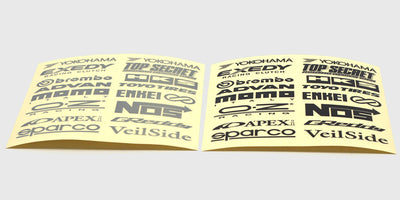 To ark med Bigz logo-klistermærker til fjernstyrede biler i både sølv og sort finish.