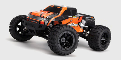 Rød Ravage fjernstyret monster truck med store dæk og robust affjedring til offroad kørsel.